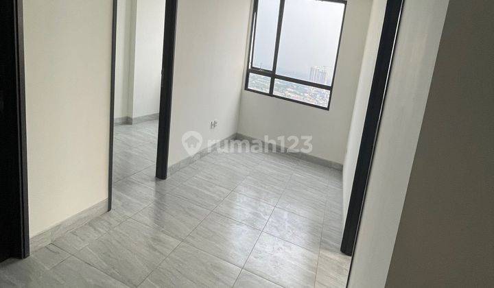 Murah Siap Huni Apartemen Collins Boulevard 2 Kamar Tidur Semi Furnished Baru 1