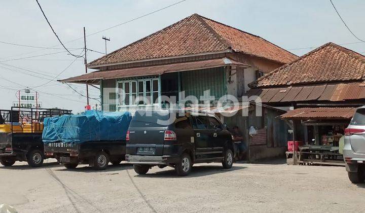 Rumah panggung pinggir sungai musi 1