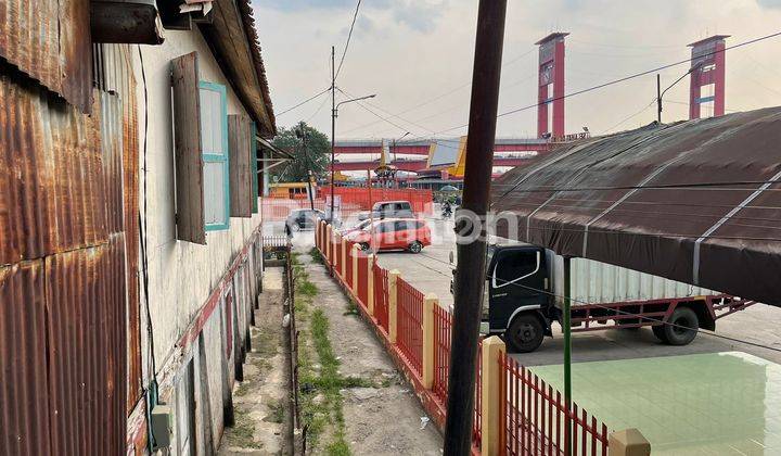 Rumah panggung pinggir sungai musi 2