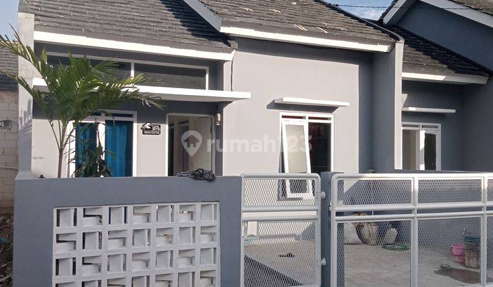 RUMAH MINIMALIS LOKASI STRATEGIS DI CIKONENG BOJONGSOANG DEKAT STT TELKOM TRANSMAT TOL BUAHBATU AGUNGPODOMORO DI ARJUNA LAND CITY 8