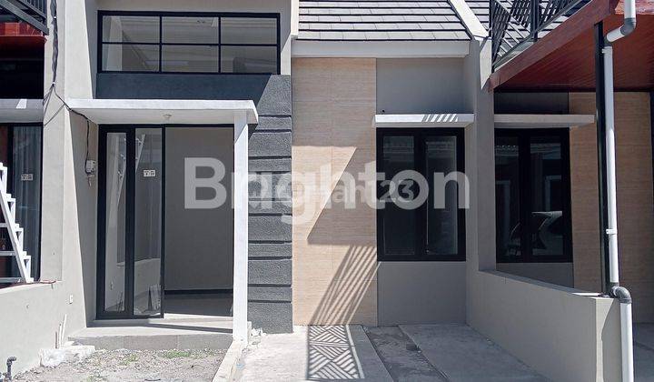 Rumah Minimalis modern di Alana Wonorejo 1