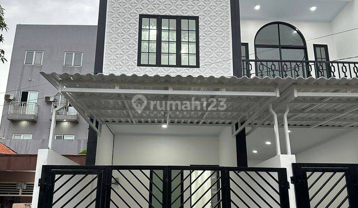 Dijual Rumah Modern Klasik Dekat Central Park Mall 1