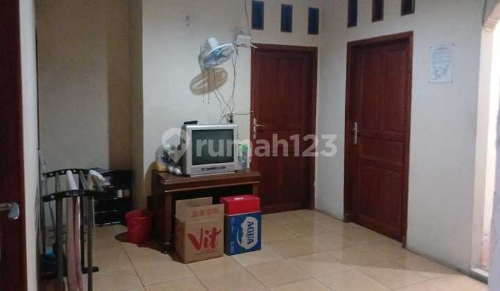 Ready-to-Live-In House with Comfortable and Lush Living in Beji, Depok