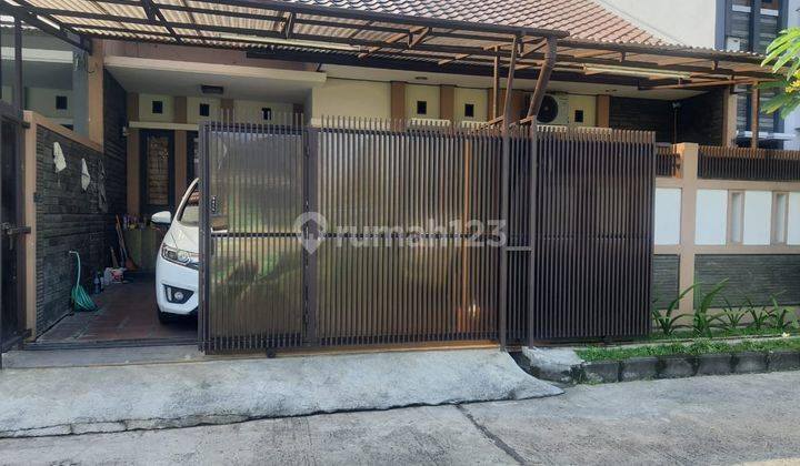 Rumah Asri Semi Furnished di Taman Kopo Indah 1