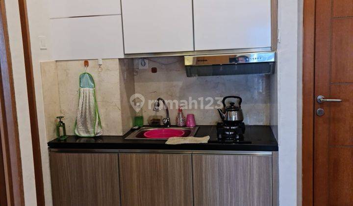 Dijual BU THE NEST APARTEMENT 2 Kamar Tidur View kolam Renang dan Playground Hoek 4
