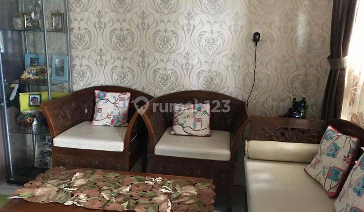 ruang tamu rumah asri 1 lantai di