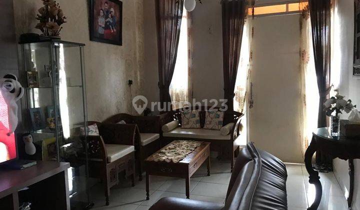 ruang tamu rumah asri 1 lantai di