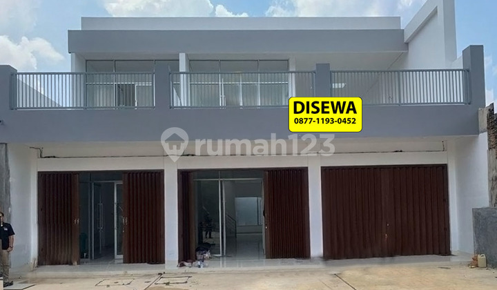 New 2-Door 2-Story Row House by Wolter Monginsidi Roadside. 2