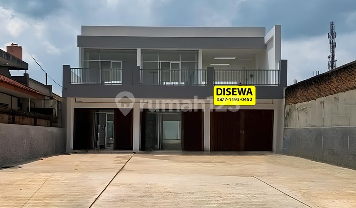 New 2-Door 2-Story Row House by Wolter Monginsidi Roadside. 1