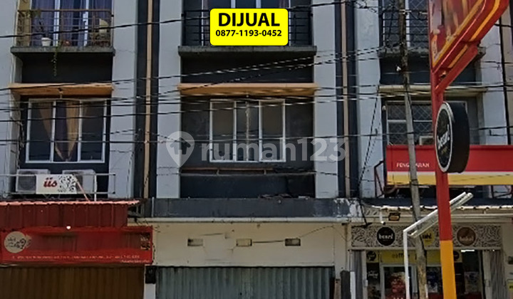 For Sale 3-Street Shop Building on Wolter Monginsidi Roadside 2