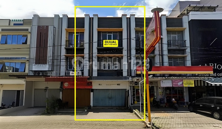 For Sale 3-Street Shop Building on Wolter Monginsidi Roadside 1