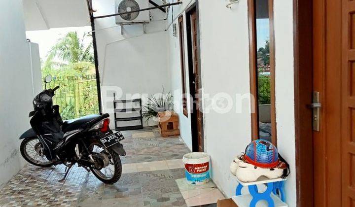 rumah kos 14 kamar di tengah kota. 2