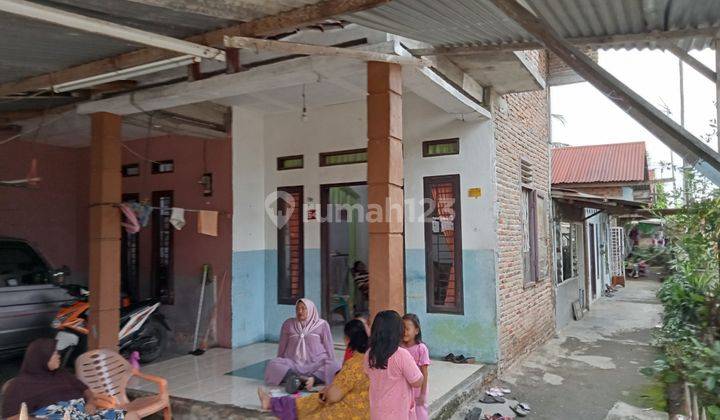 Tanah Ukuran 15.1 X 30 M, 453 M², Dengan 5 Buah Rumah Kontrakan. Sk Camat, Bisa Naik Ke Shm. Jl. Sejati Marendal. Cocok Juga Untuk Developer Bangun Perumahan 5