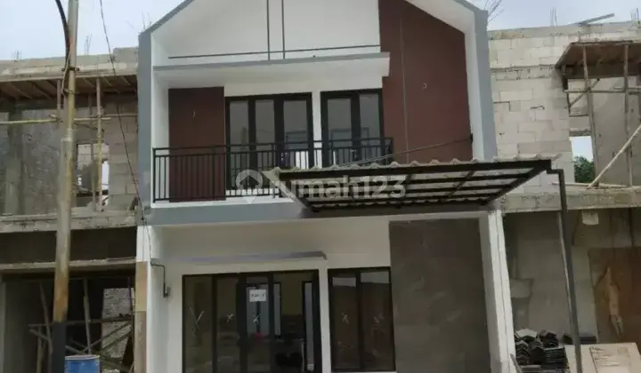 RUMAH 2 LANTAI MINIMALIS MODERN DP 0 % 100 METER KE JALAN UTAMA 2