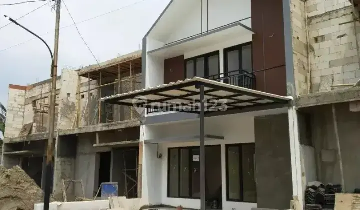 RUMAH 2 LANTAI MINIMALIS MODERN DP 0 % 100 METER KE JALAN UTAMA 3