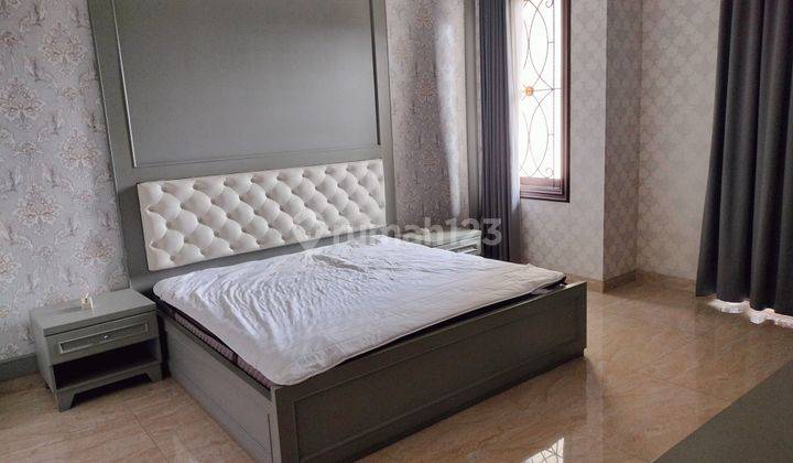 Rumah Cantik Di Taman Surya  200m² Furnished 2 Lantai 6
