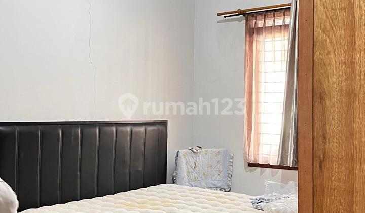 Ready-to-Occupy House, Prime Location on Main Road in Mekar Wangi Cluster. 2