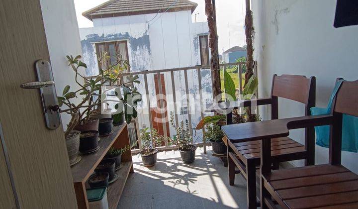 RUMAH LANTAI 2 LOKASI  JL RAYA TUKA DALUNG 1