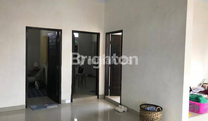 RUMAH 2 LANTAI LINGKUNGAN PERUMAHAN DI RENON 2