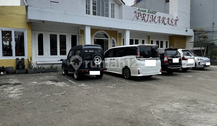 Commercial plot 657 m2 with certificate of ownership by the roadside in Meruya