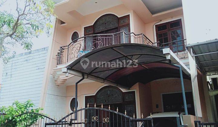 Rumah Taman Puspa Raya Citraland Surabaya Barat 2