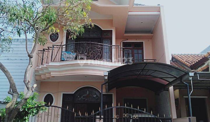 Rumah Taman Puspa Raya Citraland Surabaya Barat 1