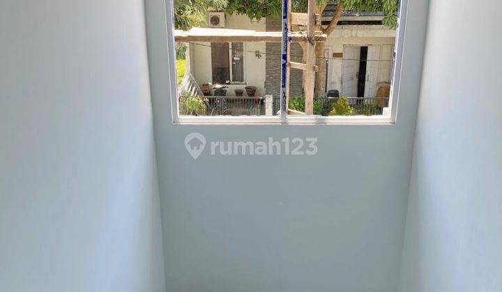 Rumah 2 Lantai di Bukit Palma, Surabaya Gress, Modern Minimalis 1