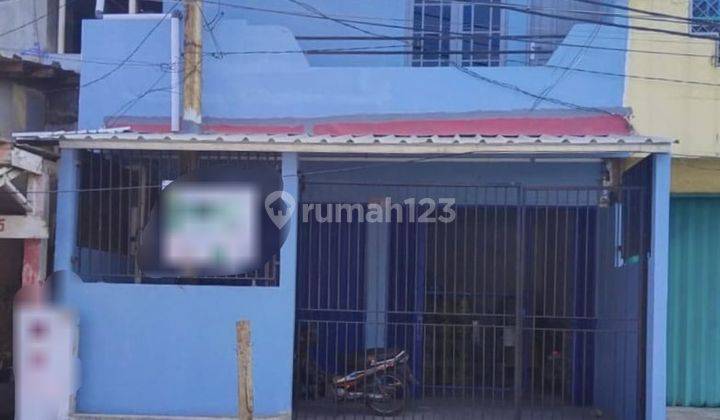 Dijual rumah lokasi jalan rame di Kapuk Kamal Raya 1