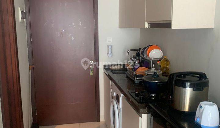 JUAL RUGI !!! Apartement baru di bawah MALL 2BR di Green Sedayu Taman Palem 2