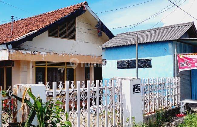 rumah kedamaian pinggir jalan utama 2