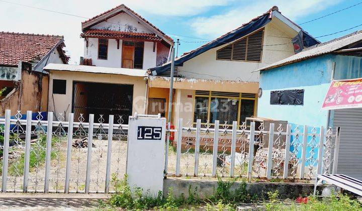 rumah kedamaian pinggir jalan utama 1