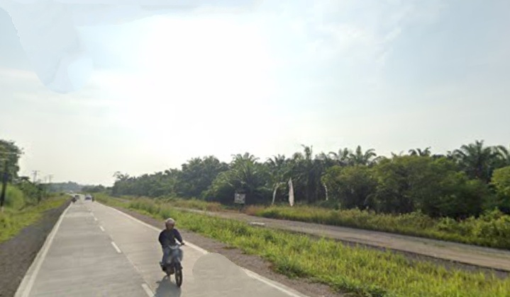 Empty land along the two-lane road of Jln. Terusan Ryacudu, Kota baru JATI AGUNG, South Lampung (Lampung).