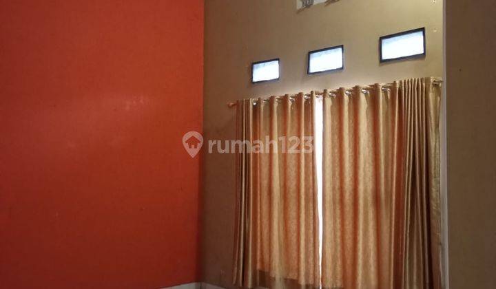 ruang tamu rumah dua lantai dijalan p.