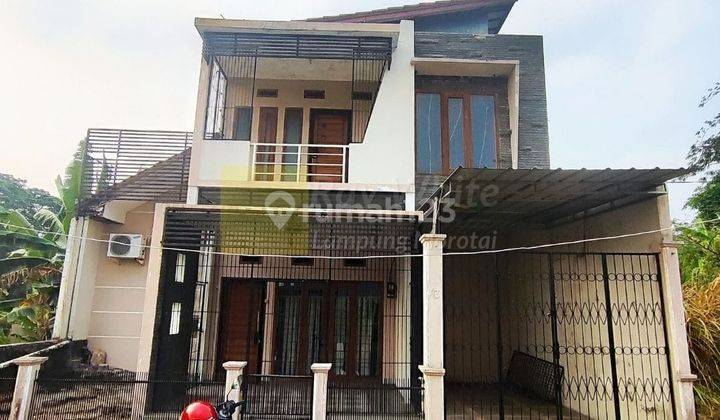 Di  Rumah Modern Minimalis dua Lantai zk 1