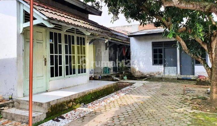 Dijual  Rumah dengan Kamar Kost 10 pintu 2