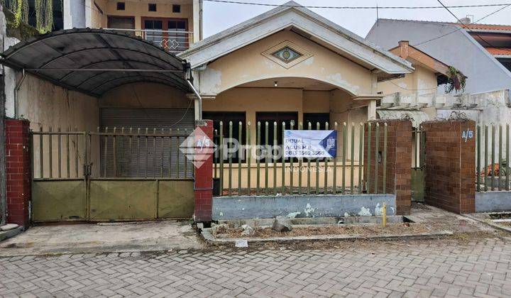 tampak depan rumah hitung tanah di perumahan