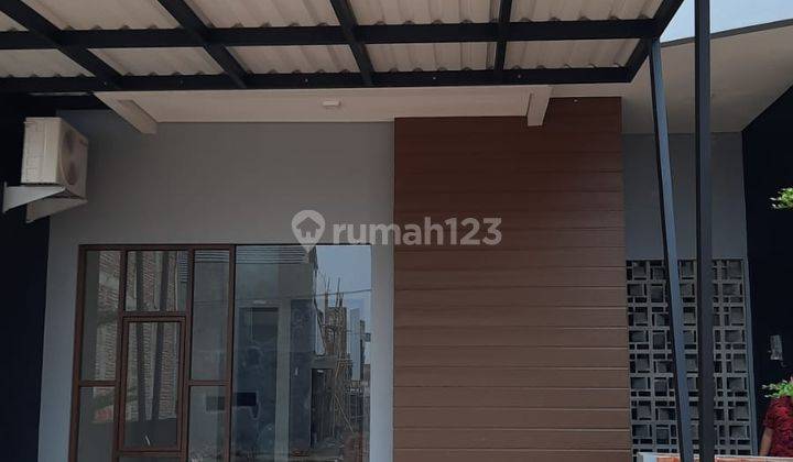 Rumah di Perumahan Pesona Remboelan, Serpong Tangerang Selatan 1