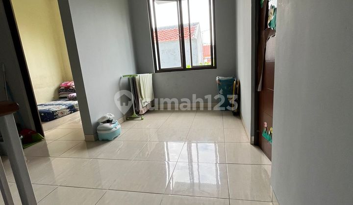 Disewakan Rumah di Heliconia Harapan Indah Bekasi 6