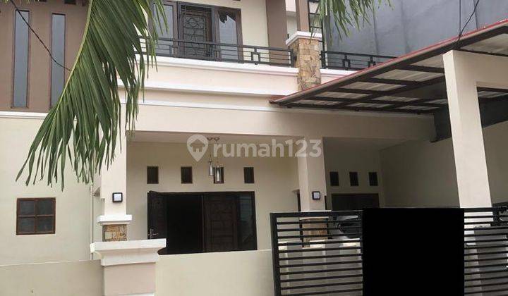 Rumah Tinggal Modern Minimalis Taman Harapan Baru 2