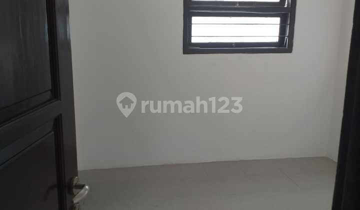 Rumah 2 Lantai Bagus Unfurnished di Raffles Hills , Jakarta Timur 11