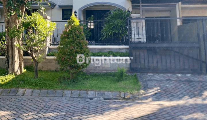 Rumah Graha Famili Tropical Minimalis Mewah Terawat dan Sudah Siap di Tempati 1