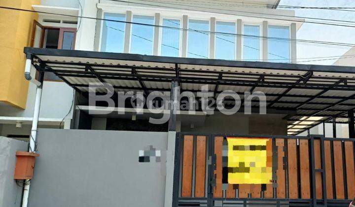 RUMAH 2 LANTAI TEPI JALAN ADI SUMARMO 1