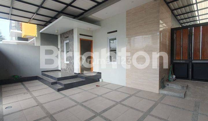 RUMAH 2 LANTAI TEPI JALAN ADI SUMARMO 2