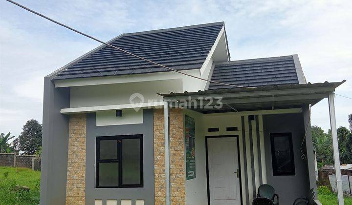 Rumah dengan konsep minimalis modern di Tamansari hill 1