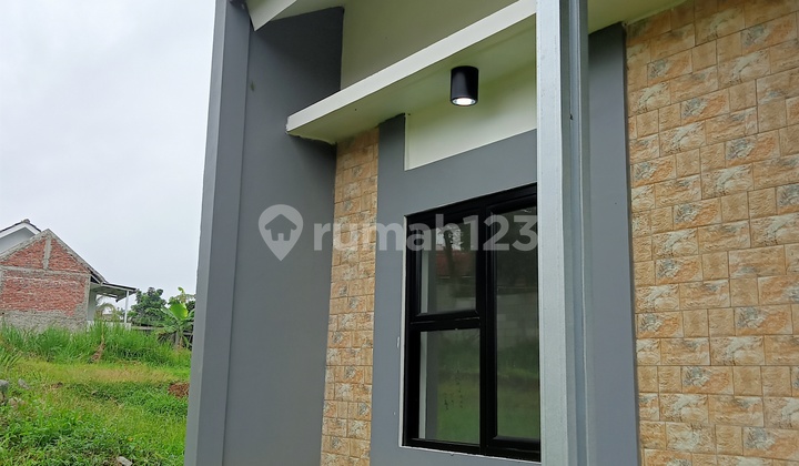 Rumah dengan konsep minimalis modern KPR dijual 2