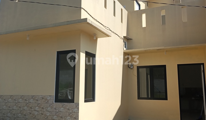 Modern Minimalist Concept Housing with Mount Salak View Modern Minimalist Concept Housing with Mount Salak View