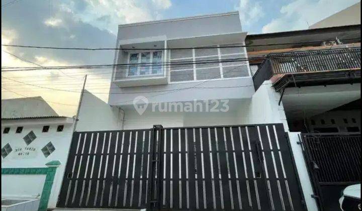 Rumah 2 Lt Siap Huni Modern Di Harapan Baru  1