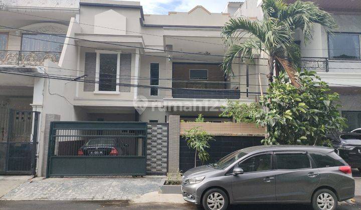 rumah 2 Lantai10x21 di taman semanan indah bagus jual cepat nego 1