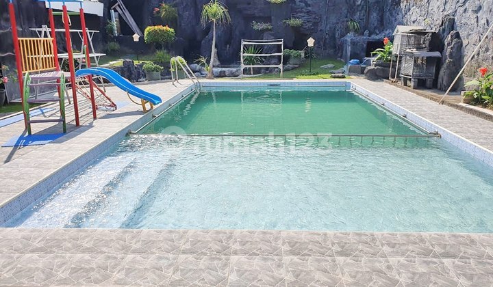 RUMAH DI KUPANG INDAH STRATEGIS, ADA SWIMMING POOL 1