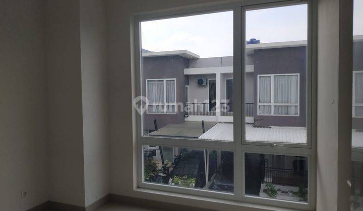 Rumah 2 Lantai dalam Cluster yang rapi di Graha Raya Bintaro  1